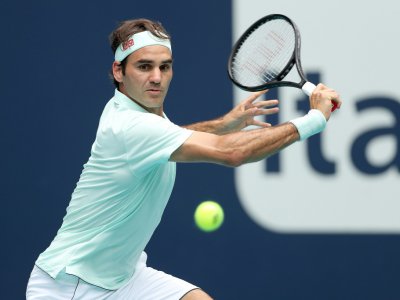 Le Suisse Roger Federer face à l'Américain John Isner en finale du tournoi de Miami, le 31 mars 2019 - MATTHEW STOCKMAN [Getty/AFP/Archives]