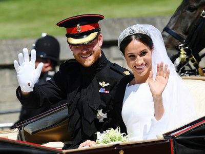 Le prince Harry et son épouse Meghan après leur cérémonie de mariage, à Windsor le 19 mai 2018 - Paul ELLIS [POOL/AFP/Archives]
