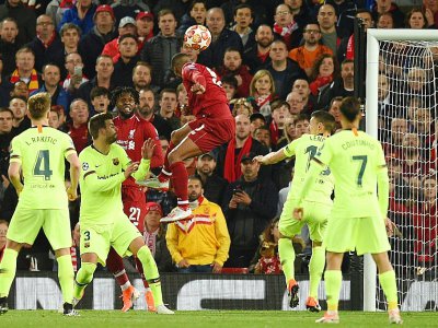 Georginio Wijnaldum inscrit le 3e but de Liverpool, son doublé, contre le Barça en demi-finale de la Ligue des champions, le 7 mai 2019 à Anfield - Oli SCARFF [AFP]