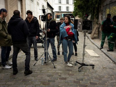 Les élèves de l'école de cinéma fondée par Ladj Ly à Clichy-sous-Bois, en tournage à Paris le 12 avril 2019 - Lionel BONAVENTURE [AFP]