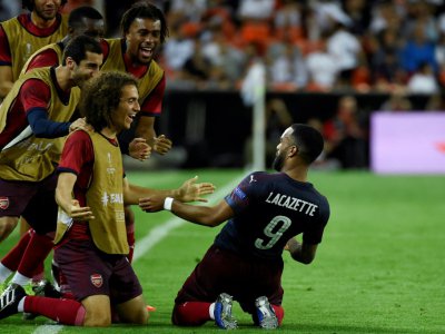 L'attaquant français d'Arsenal Alexandre Lacazette exulte après son but contre Valence en demi-finale retour de Ligue Europa, le 9 mai 2019 à Mestalla - JOSE JORDAN [AFP]