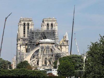Des échaffaudages installés sur Notre-Dame gravement endommagée par un incendie, le 7 mai 2019 à Paris - Ludovic MARIN [AFP]