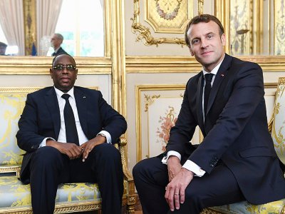 Le président Macron (D) et le président sénégalais Macky Sall (G), le 15 mai 2019 à l'Elysée - Alain JOCARD [AFP]