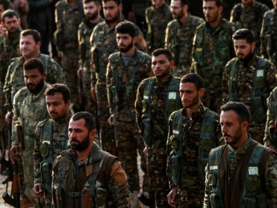 Des combattants du YPK aux funérailles d'un commandant kurde de l'organisation, en décembre 2018 à Kameshli, en Syrie - Delil SOULEIMAN [AFP/Archives]