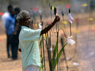 Un tamoul srilankais participe à une cérémonie à Mullaivaukkal près de Jaffna le 18 mai 2019 - ISHARA S. KODIKARA [AFP]