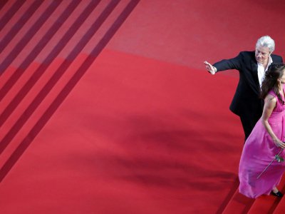 L'acteur mythique Alain Delon, aux côtés de Aurélie Filippetti, ministre de la Culture, lors du 66e Festival de Cannes, le 25 mai 2013 - LOIC VENANCE [AFP]