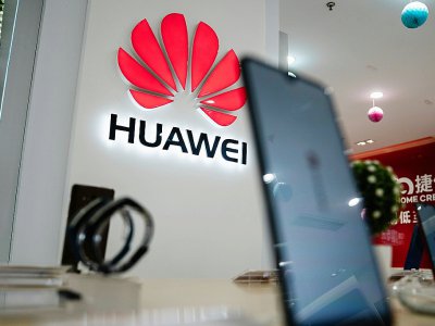 Le logo de Huawei dans un magasin de Tokyo le 20 mai 2019 - FRED DUFOUR [AFP]