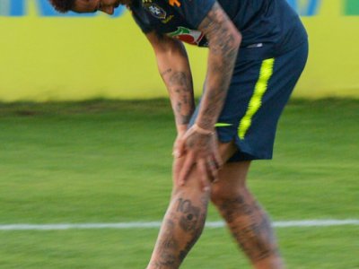 Douleur au genou pour Neymar en séance d'entraînement à Teresopolis le 28 mai 2019 - Carl DE SOUZA [AFP]