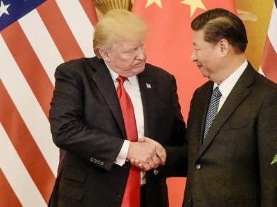 Les présidents américain et chinois Donald Trump (g) et Xi Jinping, le 9 novembre 2017 à Pékin - Fred DUFOUR [AFP/Archives]