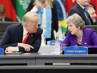 Le président américain Donald Trump(G) et la Première ministre britannique Theresa May (D) lors du sommet du G20, le 30 novembre 2018 à Buenos Aires, en Argentine - Alejandro PAGNI [AFP/Archives]