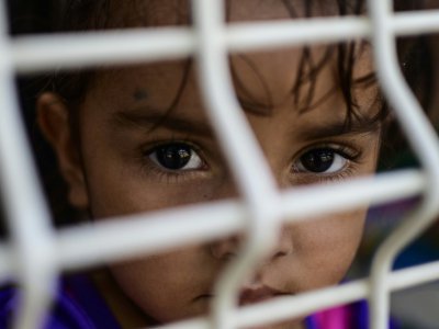 Une fillette attend un visa humanitaire à Ciudad Hidalgo (sud du Mexique), le 6 juin 2019 - PEDRO PARDO [AFP/Archives]