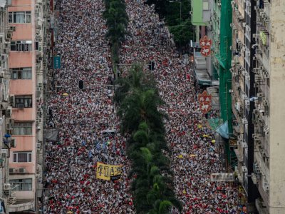 Manifestation contre un projet de loi d'extradition vers la Chine continentale, le 9 juin 2019 à Hong Kong - Philip FONG [AFP]