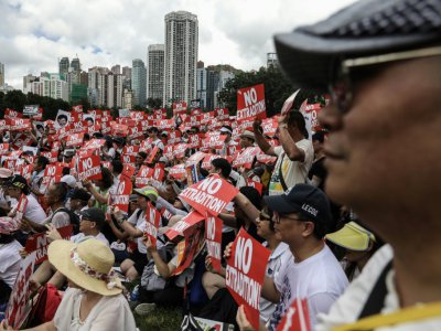 Manifestation contre un projet de loi d'extradition vers la Chine continentale, le 9 juin 2019 à Hong Kong - DALE DE LA REY [AFP]