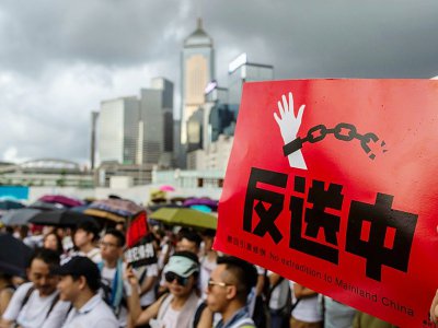 Lors de la marche du 9 juin 2019 à Hong Kong, organisée pour dénoncer un projet du gouvernement local d'autoriser des extraditions vers la Chine continentale - Philip FONG [AFP]