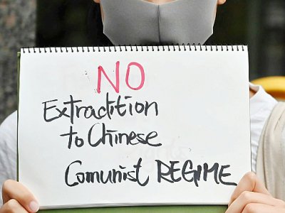 Lors de la manifestation du 9 juin 2019 à Hong Kong, organisée pour protester contre un projet de loi d'extradition vers la Chine continentale - Charly TRIBALLEAU [AFP]
