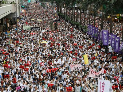 Manifestation contre le projet de loi du gouvernement local d'autoriser les extraditions vers la Chine continentale, le 9 juin 2019 à Hong Kong - Dale DE LA REY [AFP]
