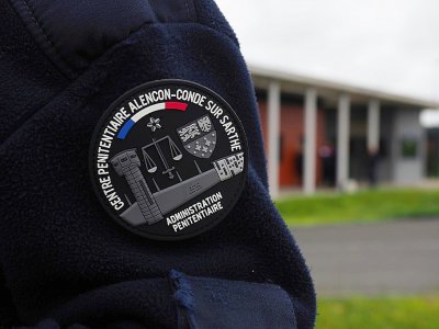 Badge d'un gardien de la prison de Condé-sur-Sarthe, le 12 juin 2019 - GUILLAUME SOUVANT [AFP]
