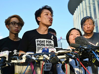 Jimmy Sham, du Civil Human Rights Front, parle aux journalistes à Hong Kong le 15 juin 2019 - HECTOR RETAMAL [AFP]