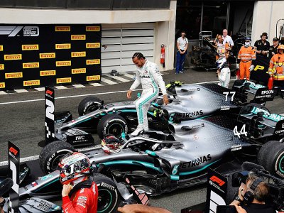 Le Britannique Lewis Hamilton (c) vainqueur du GP de France de F1 le 23 juin 2019 - GERARD JULIEN [AFP]