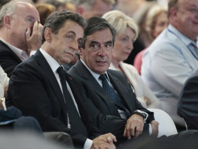 Nicolas Sarkozy et Francois Fillon lors du congrès fondateur des Républicains à Paris le 3 mai 2015 - CHARLY TRIBALLEAU [AFP/Archives]