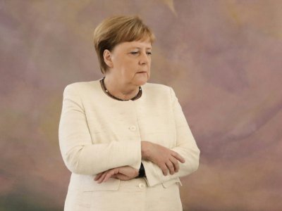 La chancelière allemande Angela Merkel lors de la cérémonie officielle de prise de fonction de la nouvelle ministre de la Justice, Christine Lambrecht au château de Bellevue à Berlin, le 27 juin 2019 - Kay Nietfeld [dpa/AFP]