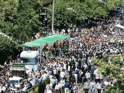 Des Iraniens participent aux funérailles publiques de 150 "martyrs" morts durant la guerre Iran-Irak (1980-1988), le 27 juin 2019 à Téhéran - - [afp/AFP]