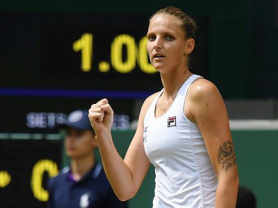 La Tchèque Karolina Pliskova contre la Portoricaine Monica Puig au 2e tour de Wimbledon, le 3 juillet 2019 - Ben STANSALL [AFP]