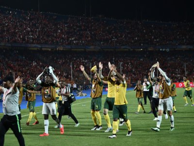 Les joueurs de l'Afrique du Sud fêtent leur victoire sur l'Egypte en 8e de finale de la CAN au Caire le 6 juillet 2019 - OZAN KOSE [AFP]