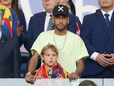 Le Brésilien Neymar et son fils lors de la finale de la Copa America entre le Brésil et le Pérou, le 7 juillet 2019 à Rio - Juan MABROMATA [AFP]