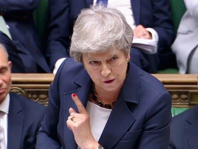Capture d'écran d'images vidéo diffusées par les services du Parlement britannique (Parliamentary Recording Unit, PRU) montrant la Première ministre Theresa May devant la Chambre des Communes à Londres le 17 juillet 2019 - Handout [PRU/AFP]
