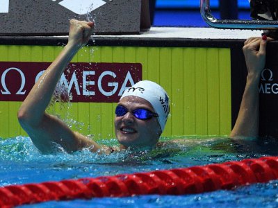 La Française Marie Watttel après sa victoire en demi-finales sur 100 m papillon aux Mondiaux de natation, le 21 juillet 2019 à  Gwangju - Oli SCARFF [AFP]