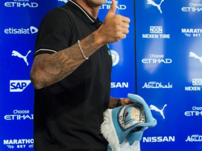 La recrue portugaise de Manchester City Joao Cancelo lors de sa présentation officielle le 8 août 2019 à Manchester - Oli SCARFF [AFP]