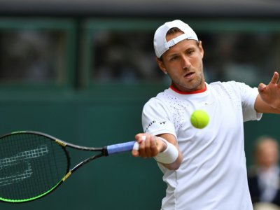 Le Français Lucas Pouille à Wimbledon le 6 juillet 2019 - GLYN KIRK [AFP/Archives]