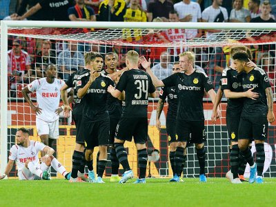 Les joueurs de Dortmund lors de la victoire 3-1 à Cologne le 23 août 2019 - UWE KRAFT [AFP]