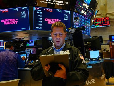 Des traders à la Bourse de New York, le 23 août 2019 - Don Emmert [AFP]