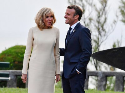 Le président Emmanuel Macron et son épouse Brigitte Macron, le 24 août 2019 à Biarritz - Nicholas Kamm [AFP]