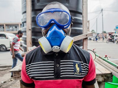 Protection obligatoire pour les équipes de lutte contre Ebola à Goma dans l'est de la République démocratique du Congo (RDC) le 31 juillet 2019 - PAMELA TULIZO [AFP]