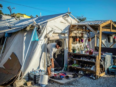 Dans le camp de réfugiés de Moria, sur l'île grecque de Lesbos, le 31 août 2019 - ANGELOS TZORTZINIS [AFP]