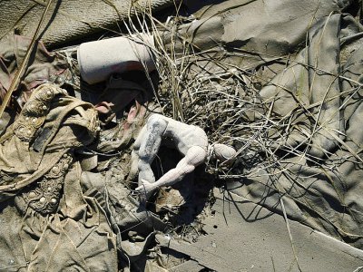 Un jouet abandonné dans la boue à Marsh Harbour, sur l'île bahaméenne d'Abaco, le 7 septembre 2019 - Brendan Smialowski [AFP]