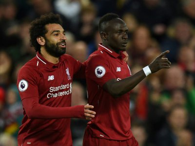 Mohamed Salah et Sadio Mané, attaquants de Liverpool, le 26 avril 2019 à Liverpool - Oli SCARFF [AFP/Archives]