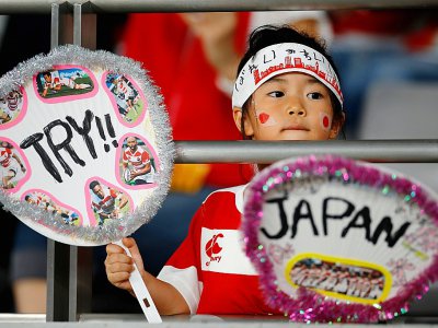 Un jeune supporter japonais lors du mach d'ouverture de la Coupe du monde entre le Japon et la Russie, le 20 septembre 2019 à Tokyo - Odd ANDERSEN [AFP]