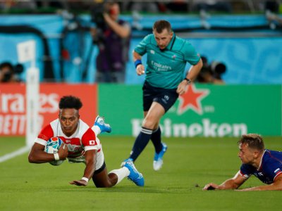 Le Japonais Kotaro Matsushima inscrit un essai face à la Russie, en match d'ouverture de la Coupe du monde de rugby, le 19 septembre 2019 à Tokyo - Odd ANDERSEN [AFP]
