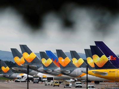 Ses avions portant le logo de Thomas Cook parqués sur le tarmac de l'aéroport de Manchester le 23 septembre 2019 après la faillite de la compagnie - Oli SCARFF [AFP]