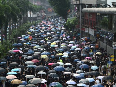 Des milliers de personnes manifestent à Hong Long le 29 septembre 2019, pour jeter de l'ombre sur les célébrations du 70e anniversaire de la Chine communiste - Mohd RASFAN [AFP]