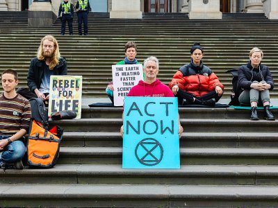 Des militants pour le climat devant le Parlement de l'Etat de Victoria, le 7 octobre 2019 à Melbourne, en Australie - ASANKA BRENDON RATNAYAKE [AFP]