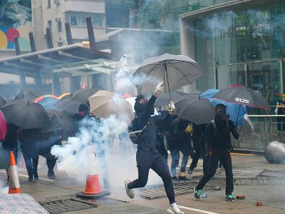 Hong Kong police fired tear gas at pro-democracy protesters after tens of thousands hit the streets once more - Nicolas ASFOURI [AFP]