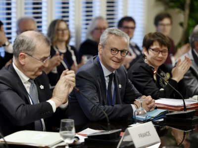 Le ministre français de l'Economie, Bruno Le Maire (c), lors d'une réunion du FMI et de la Banque Mondiale, le 17 octobre 2019 à Washington - Olivier Douliery [AFP]