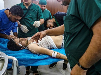 Des blessés affluent dans un hôpital de Tal Tamr, dans le nord-est de la Syrie, le 18 octobre 2019 - Delil SOULEIMAN [AFP]