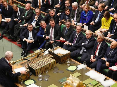 Le chef de l'opposition travailliste Jeremy Corbyn (à gauche) s'exprime durant un débat sur le Brexit au Parlement britannique, le 19 octobre 2019 à Londres. - JESSICA TAYLOR [UK PARLIAMENT/AFP]