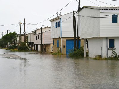 Une rue inondée à Gruissan (Aude) après de fortes précipitations le 23 octobre 2019 - Eric CABANIS [AFP]